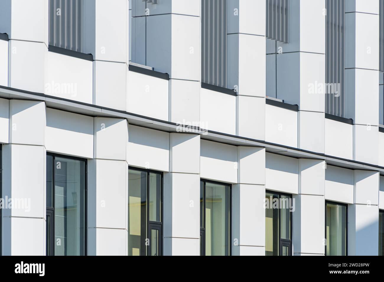 New building facade in housing complex. Modern style in architecture ...