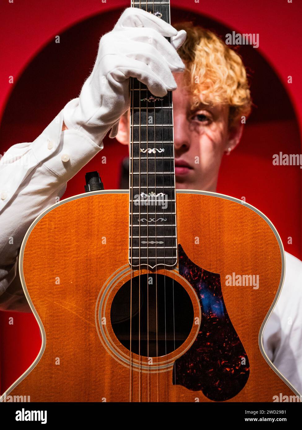 London, UK. 18th Jan, 2024. Gibson Incorporated, Nashville, Tennessee, 1985, An Acoustic Guitar, J-200, Anniversary, Celebrity, Estimate: £5,000-7,000 - A preview of The Mark Knopfler Collection at Christies in London. With more than 120 guitars and amps, the collection spans his 50-year career. The sale takes place on 31 January. Credit: Guy Bell/Alamy Live News Stock Photo