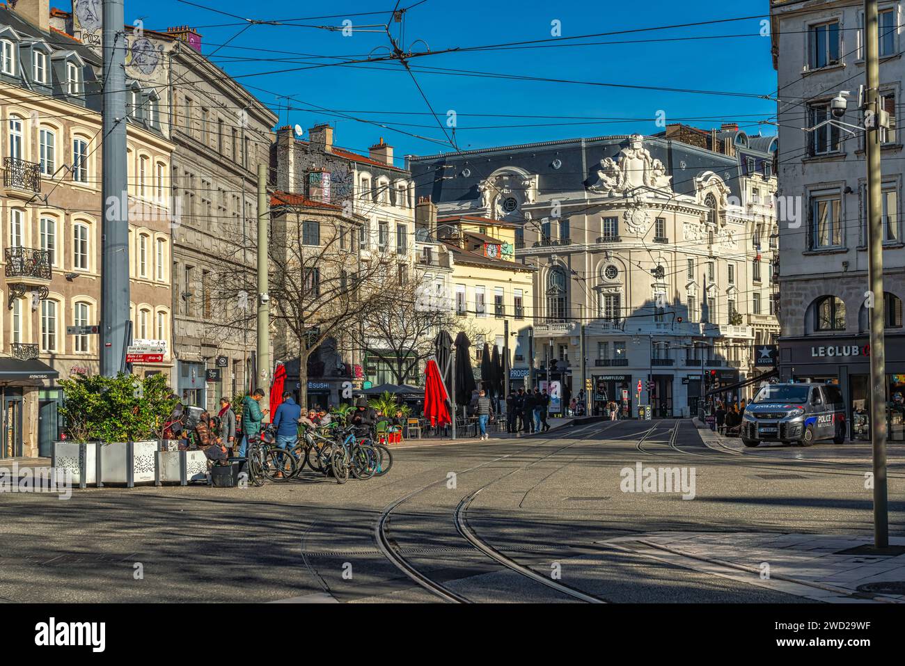 Baroque style buildings, surface metro tracks and commercial premises in Piazza del Popolo. Saint-Étienne, Auvergne-Rhône-Alpes region, France, Europe Stock Photo