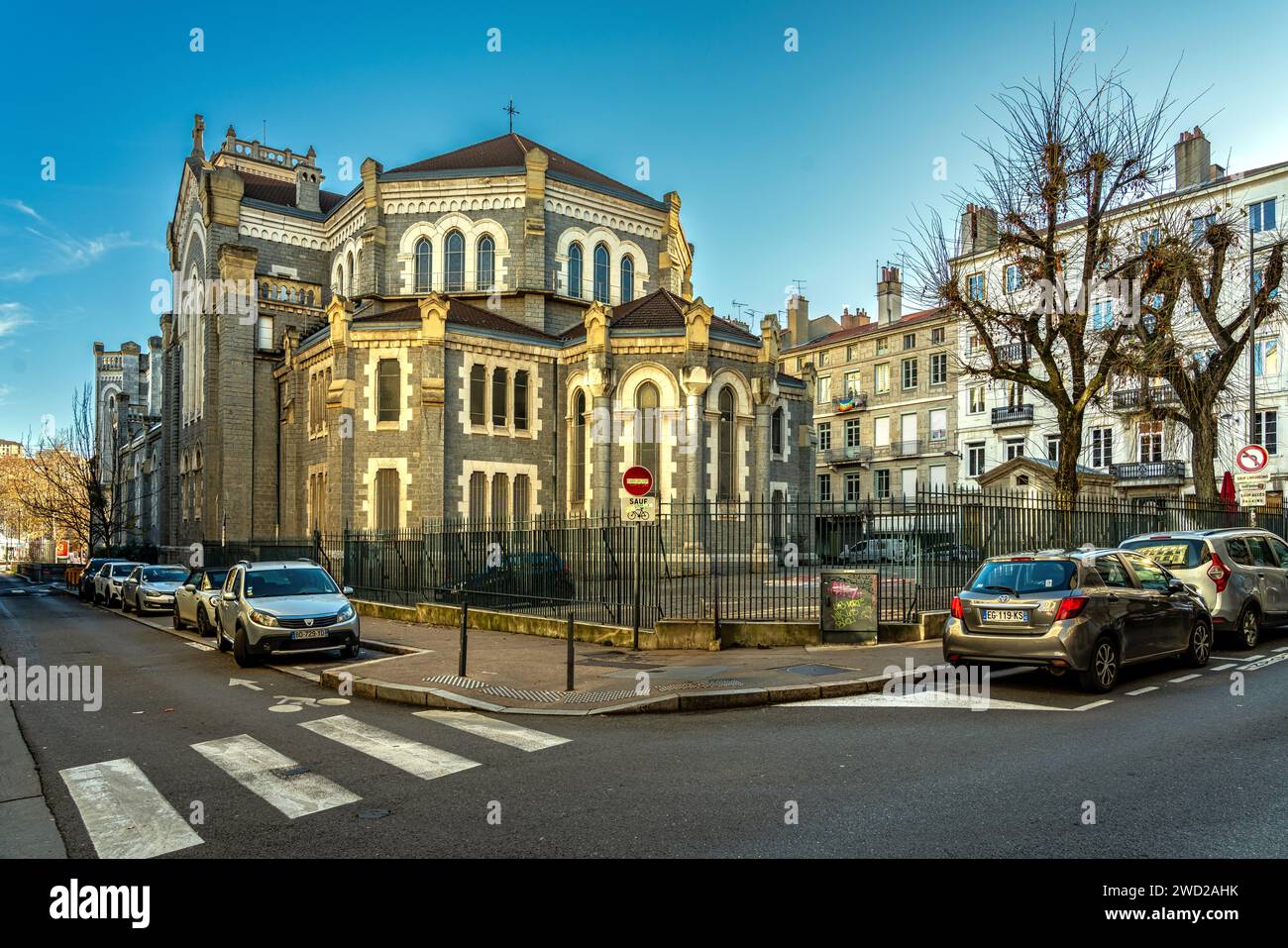 Exterior of the rear apses with the windows decorated by the stained glass windows of the cathedral dedicated to San Carlo Borromeo. Saint-Étienne Stock Photo