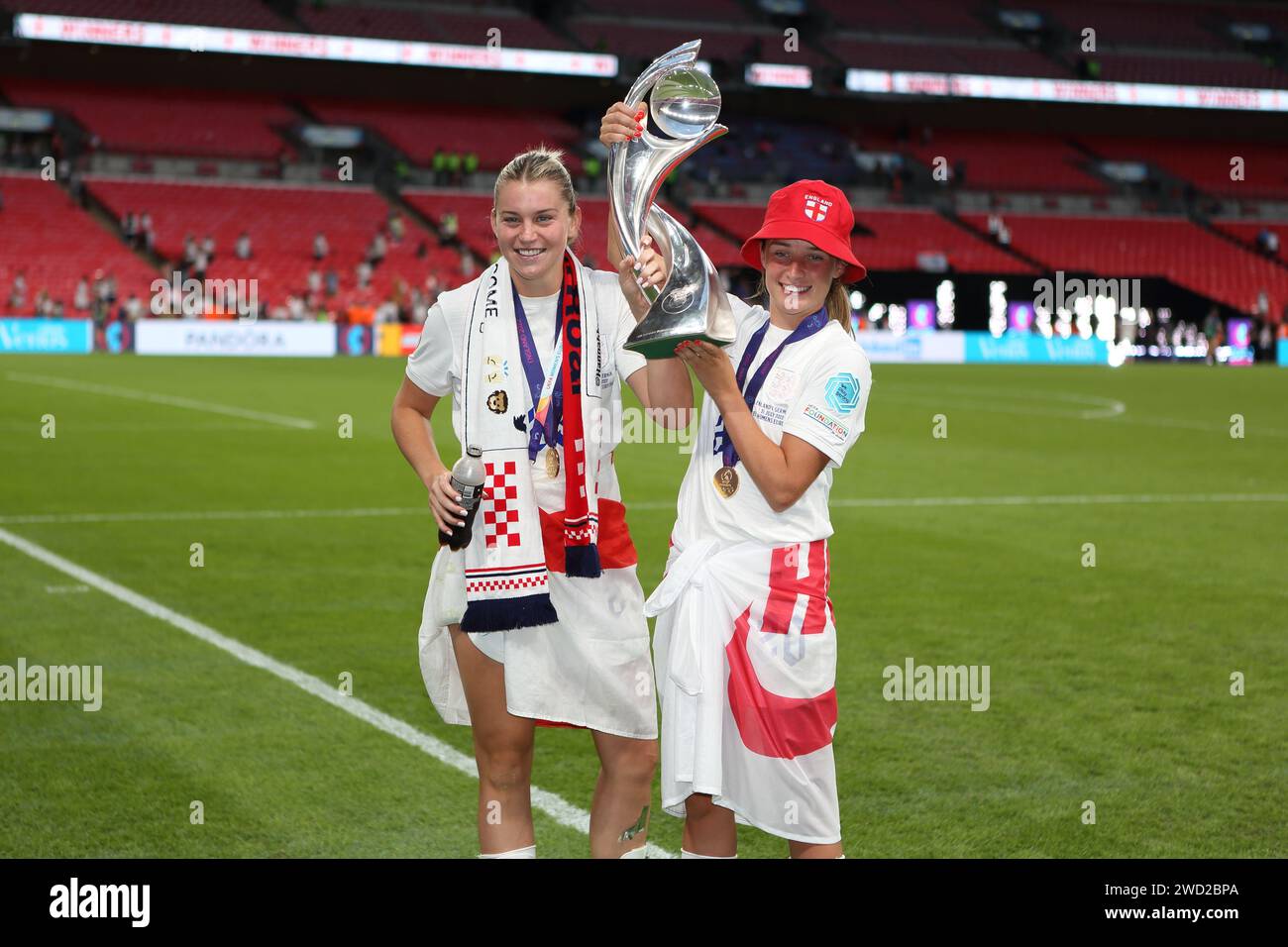 Alessia Russo and Ella Toone with trophy and winners medals UEFA Women's Euro Final 2022 England v Germany at Wembley Stadium, London 31 July 2022 Stock Photo