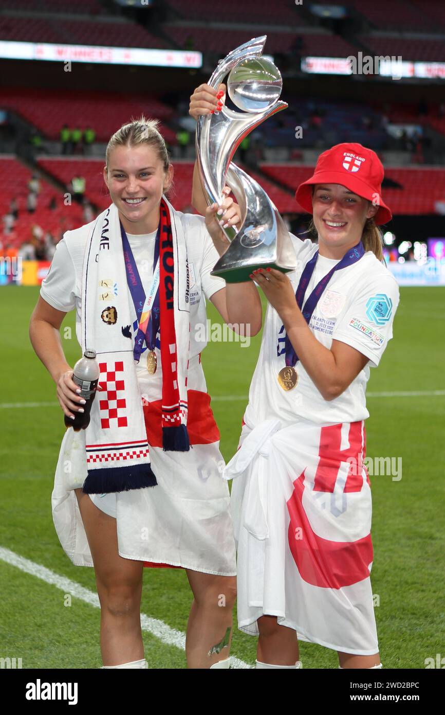 Alessia Russo and Ella Toone with trophy and winners medals UEFA Women's Euro Final 2022 England v Germany at Wembley Stadium, London 31 July 2022 Stock Photo