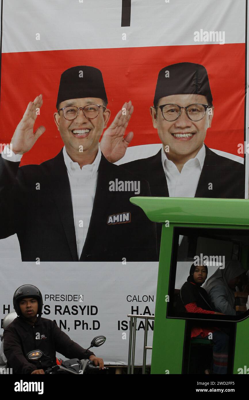 January 18, 2024, Yogyakarta, Special Region Of Yogyakarta, Indonesia: Motorcyclists pass the banner of Presidential Candidate, Anies Baswedan, and his running mate, Muhaimin Iskandar, in Yogyakarta, ahead of the Indonesian general election on February 14, 2024. (Credit Image: © Angga Budhiyanto/ZUMA Press Wire) EDITORIAL USAGE ONLY! Not for Commercial USAGE! Stock Photo