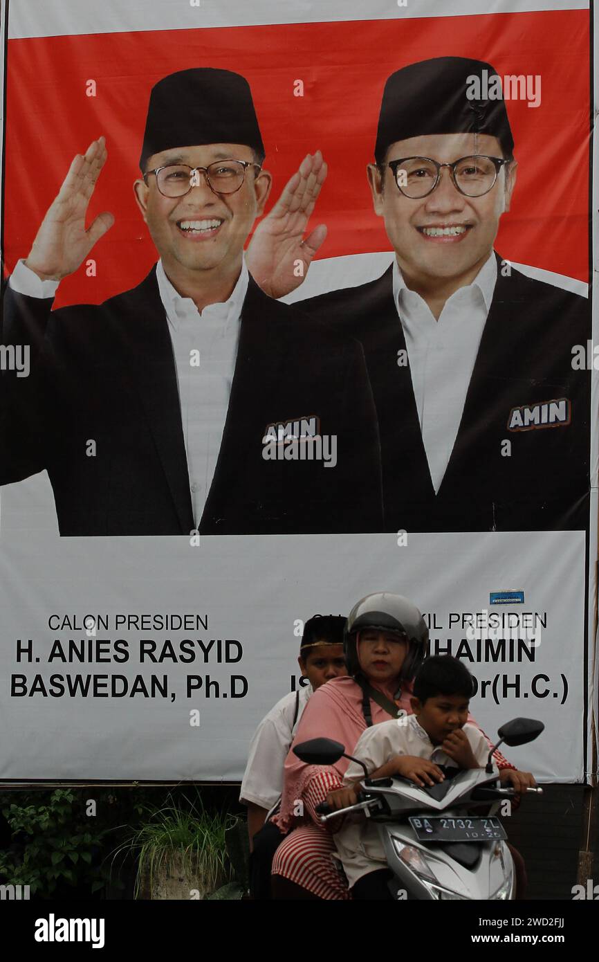 January 18, 2024, Yogyakarta, Special Region Of Yogyakarta, Indonesia: Motorcyclists pass the banner of Presidential Candidate, Anies Baswedan, and his running mate, Muhaimin Iskandar, in Yogyakarta, ahead of the Indonesian general election on February 14, 2024. (Credit Image: © Angga Budhiyanto/ZUMA Press Wire) EDITORIAL USAGE ONLY! Not for Commercial USAGE! Stock Photo