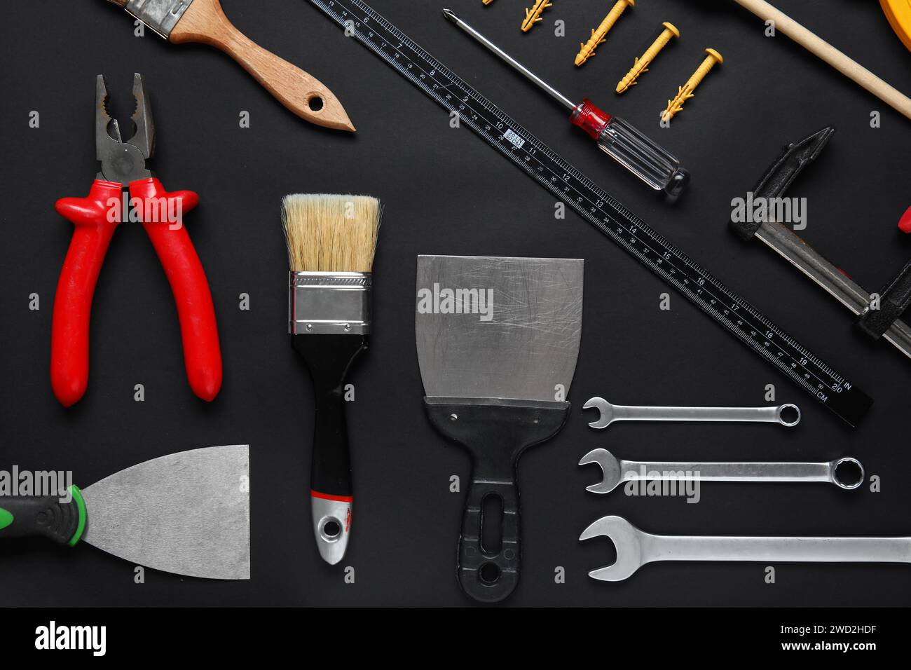 Set of construction tools on black background Stock Photo - Alamy
