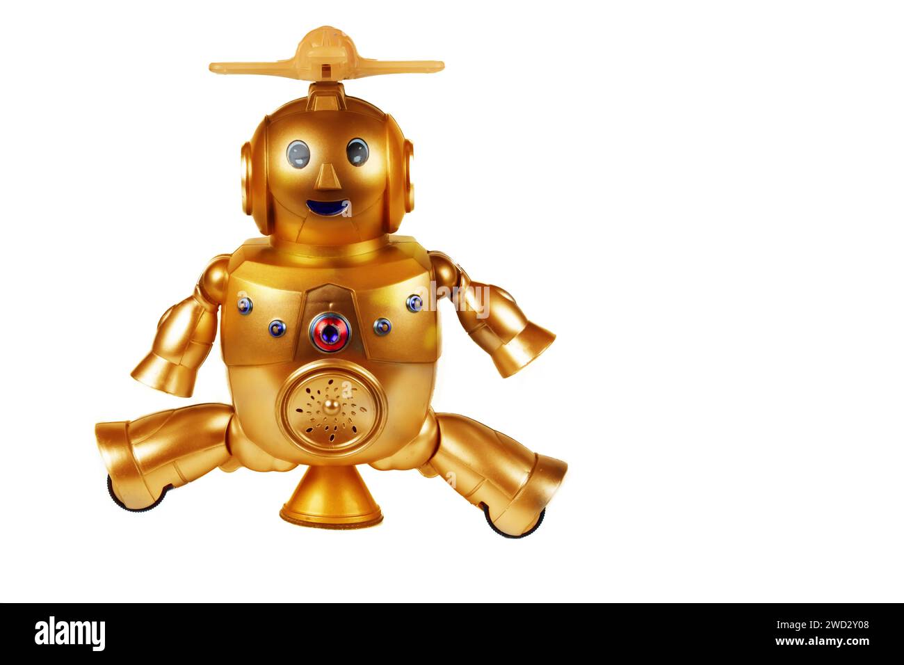 Golden toy robot isolated on white background. Dear vintage robot. Robotics. Stock Photo