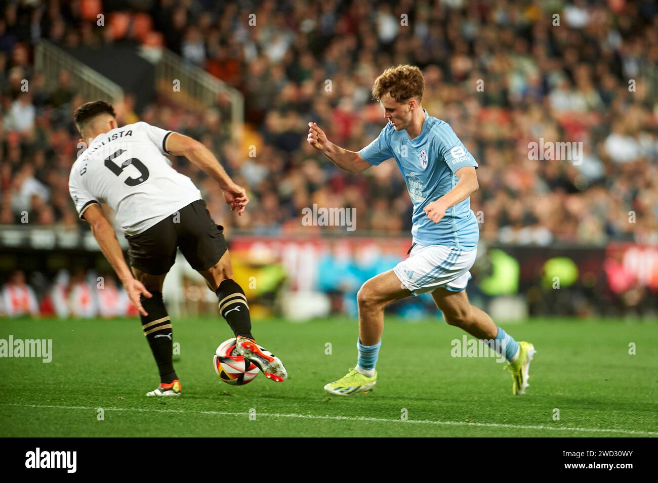 Williot Swedberg RC Celta Vigo, Gabriel Paulista of Valencia CF in action during the Eighth of final of the King's Cup 23/24 at Mestalla Stadium (Vale Stock Photo
