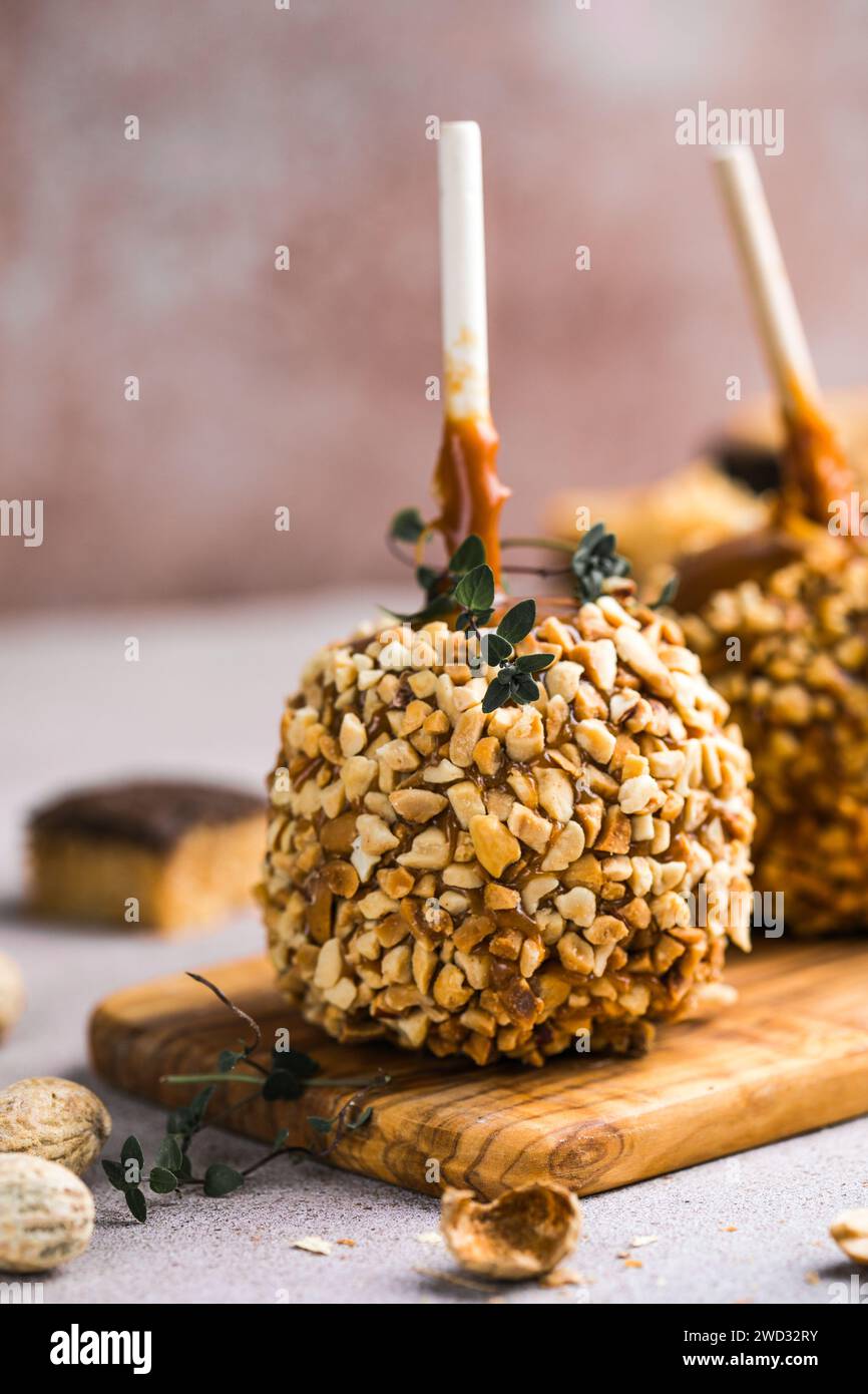Homemade Caramel Taffy Apple with Peanuts for Halloween Stock Photo