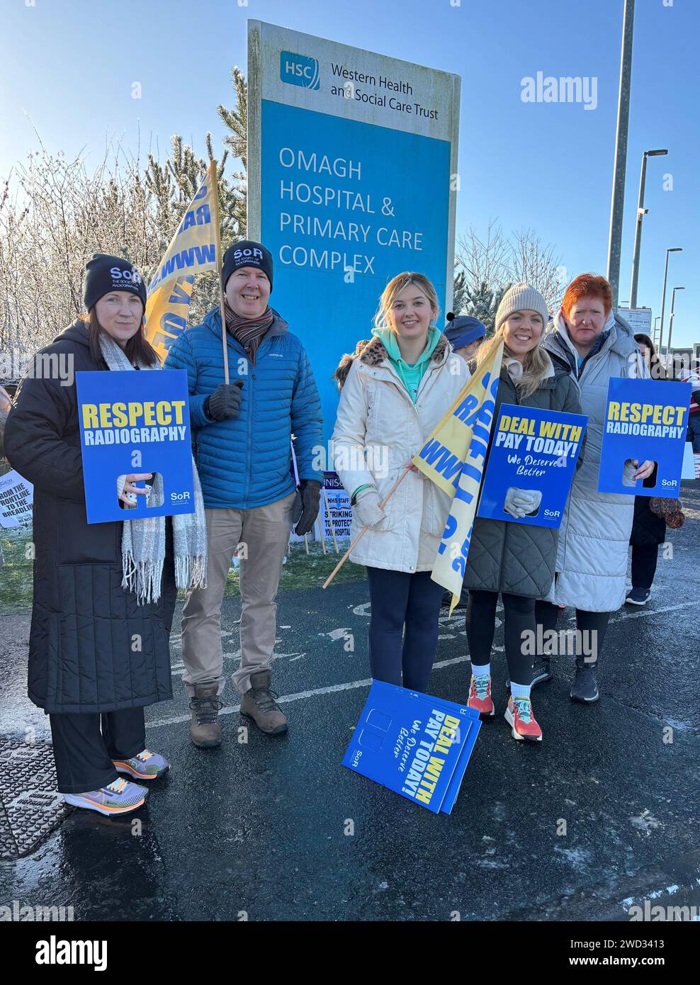 Radiographers at Omagh Hospital Deirdre Galbrath, Kevin Duffy, Stacy Waide, Hannah Nicholl and Roisin Conway, take to the picket line in Omagh, Co Tyrone, as an estimated 150,000 public sector workers take part in walkouts over pay across Northern Ireland. The strike is set to have a major impact with schools closed, hospitals offering only Christmas Day-level services, public transport cancelled as well as limited gritting of the roads in zero-degree temperatures. Picture date: Thursday January 18, 2024. Stock Photo
