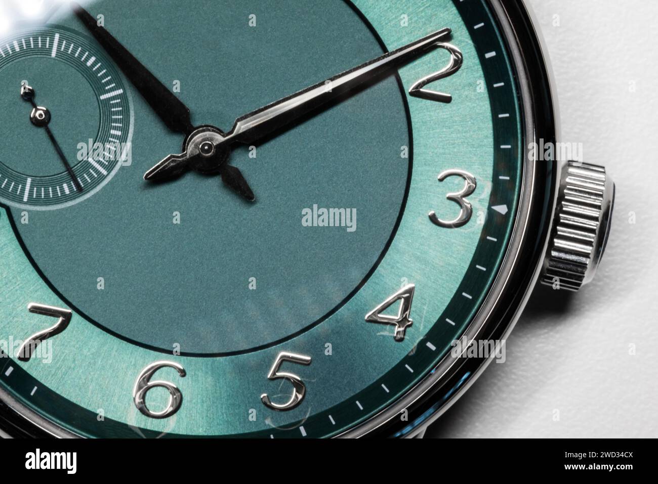 Gents wrist watch with green clock, macro photo with selective focus Stock Photo