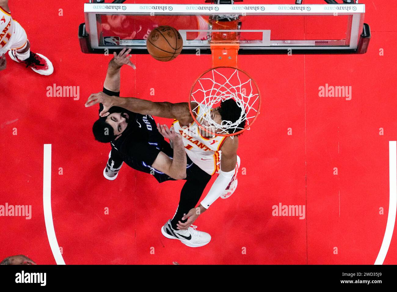 Orlando Magic center Goga Bitadze (35) battles Atlanta Hawks forward ...