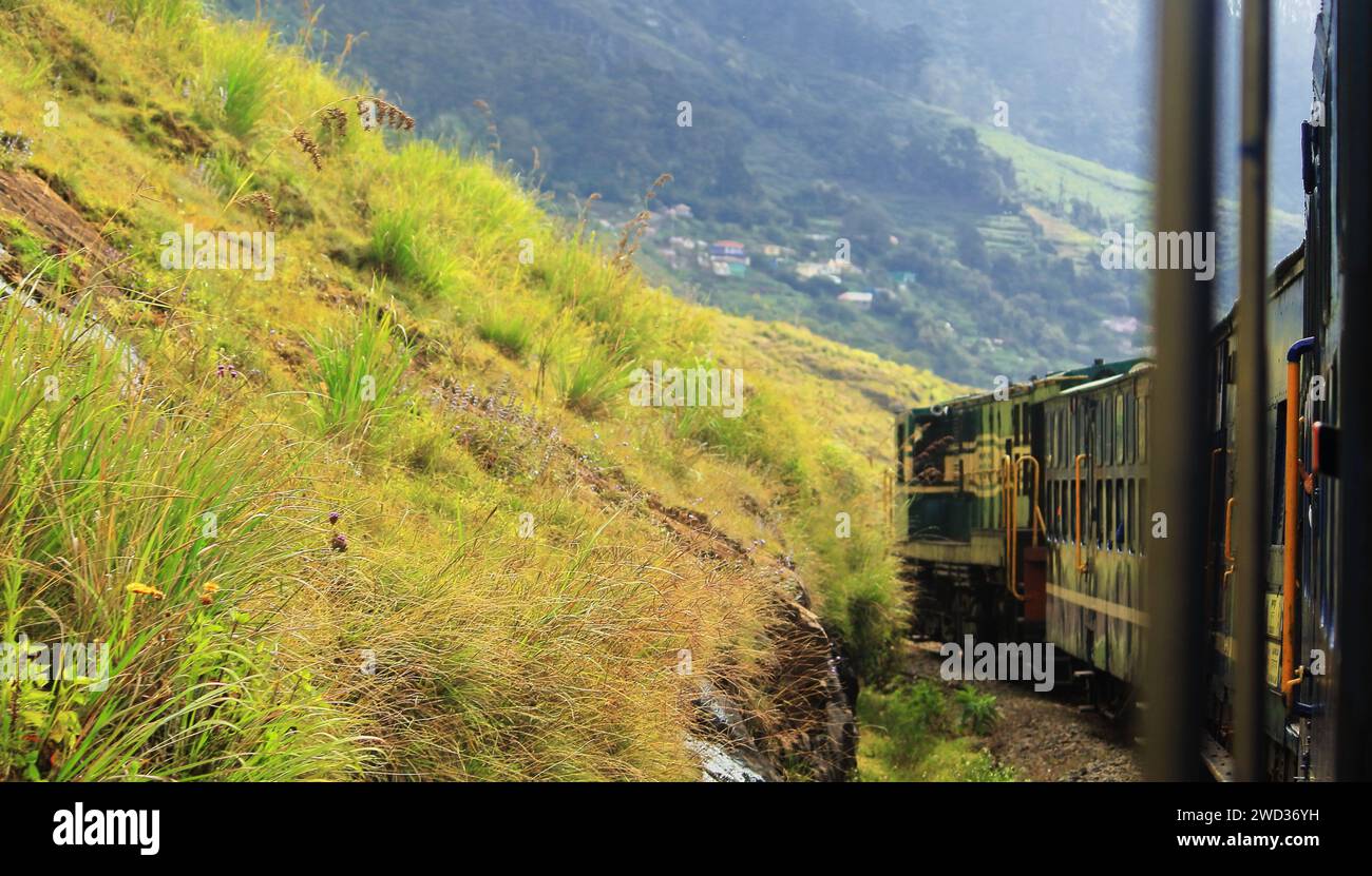 scenic railroad track of nilgiri mountain railway, beautiful toy train journey through the lush green nilgiri mountains, unesco world heritage site Stock Photo