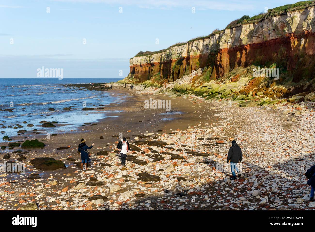 The famous red & white striped cliffs at the east coast seaside town of Hunstanton in Norfolk. Stock Photo