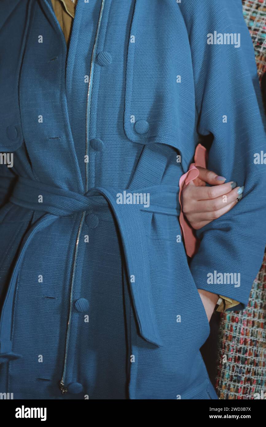 Fashion details of long blue coat. Lifestyle details. Casual clothing Stock Photo