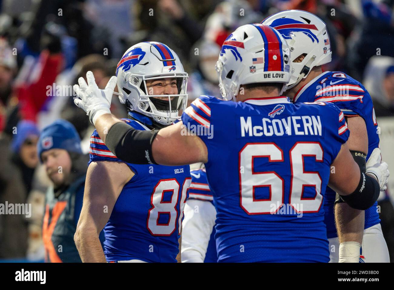 Buffalo Bills tight end Dalton Kincaid (86) celebrates with guard Connor McGovern (66) and