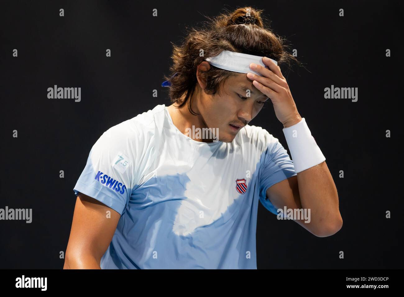 Melbourne, Australia. 18th Jan, 2024. Zhang Zhizhen of China reacts during the men's singles second round match Ugo Humbert of France and Zhang Zhizhen of China at the Australian Open tennis tournament in Melbourne, Australia, Jan. 18, 2024. Credit: Chu Chen/Xinhua/Alamy Live News Stock Photo