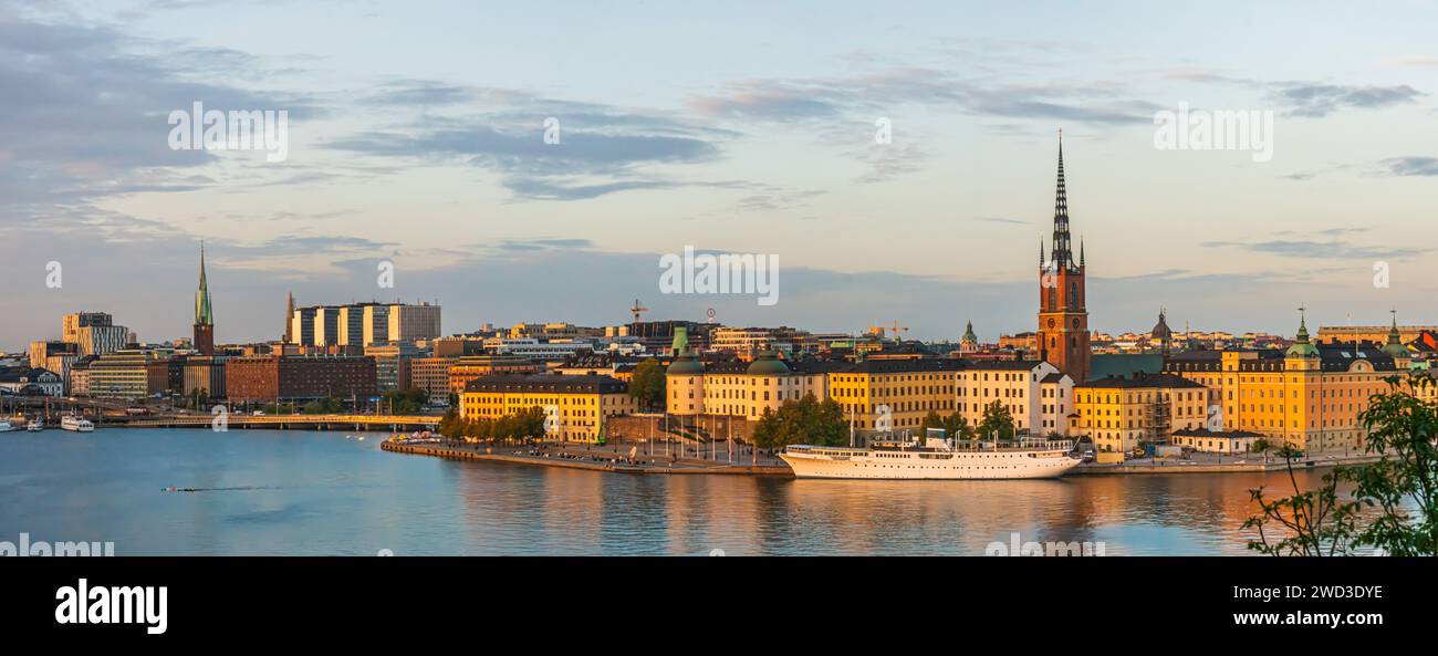 A detailed panoramic shot of the old town of Stockholm in evening sunlight lights in autumn, riddarholmen, old town,kungsholmen and the downtown Stock Photo