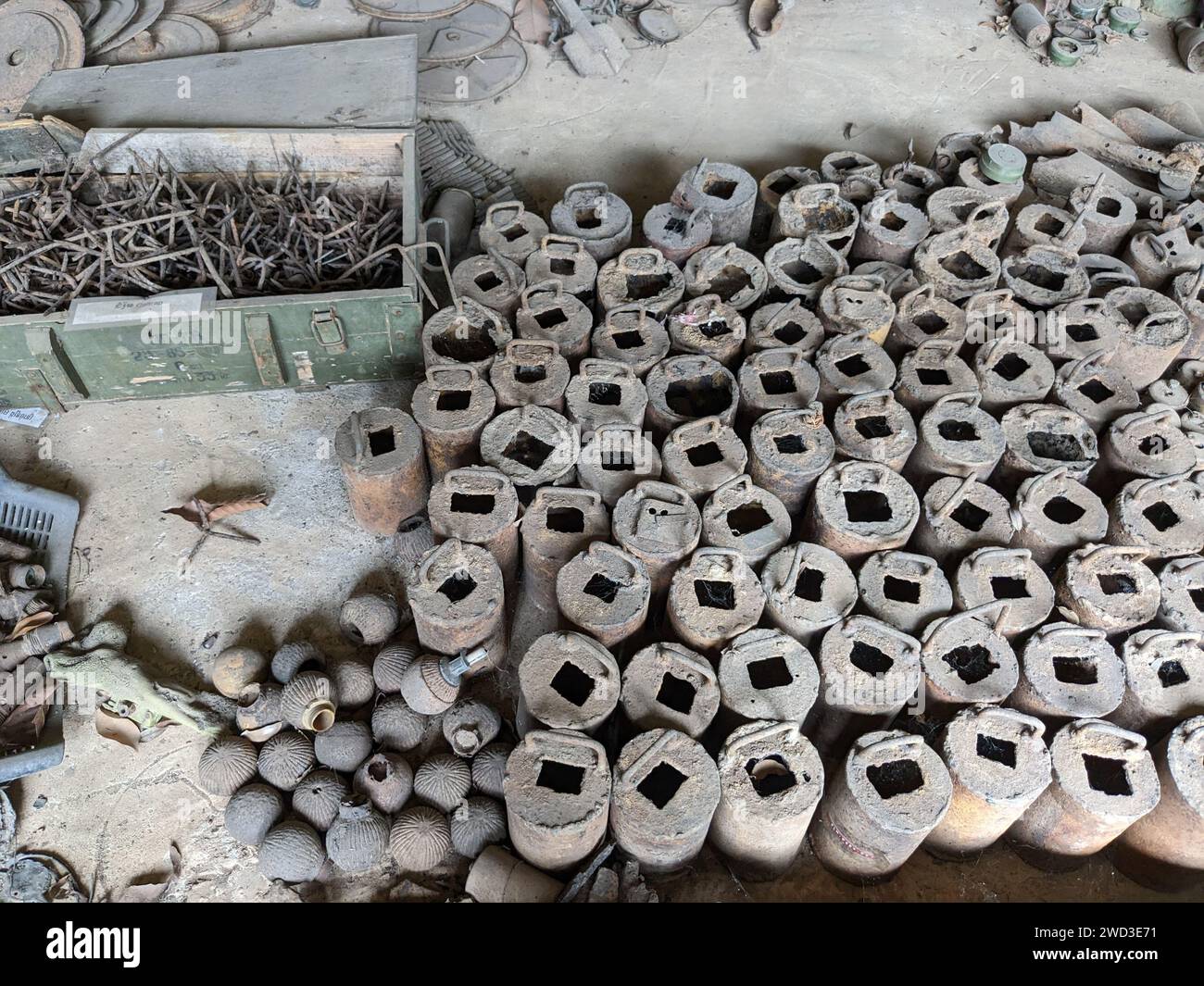 unexploded land mines and cluster bombs remains picked up all around ...