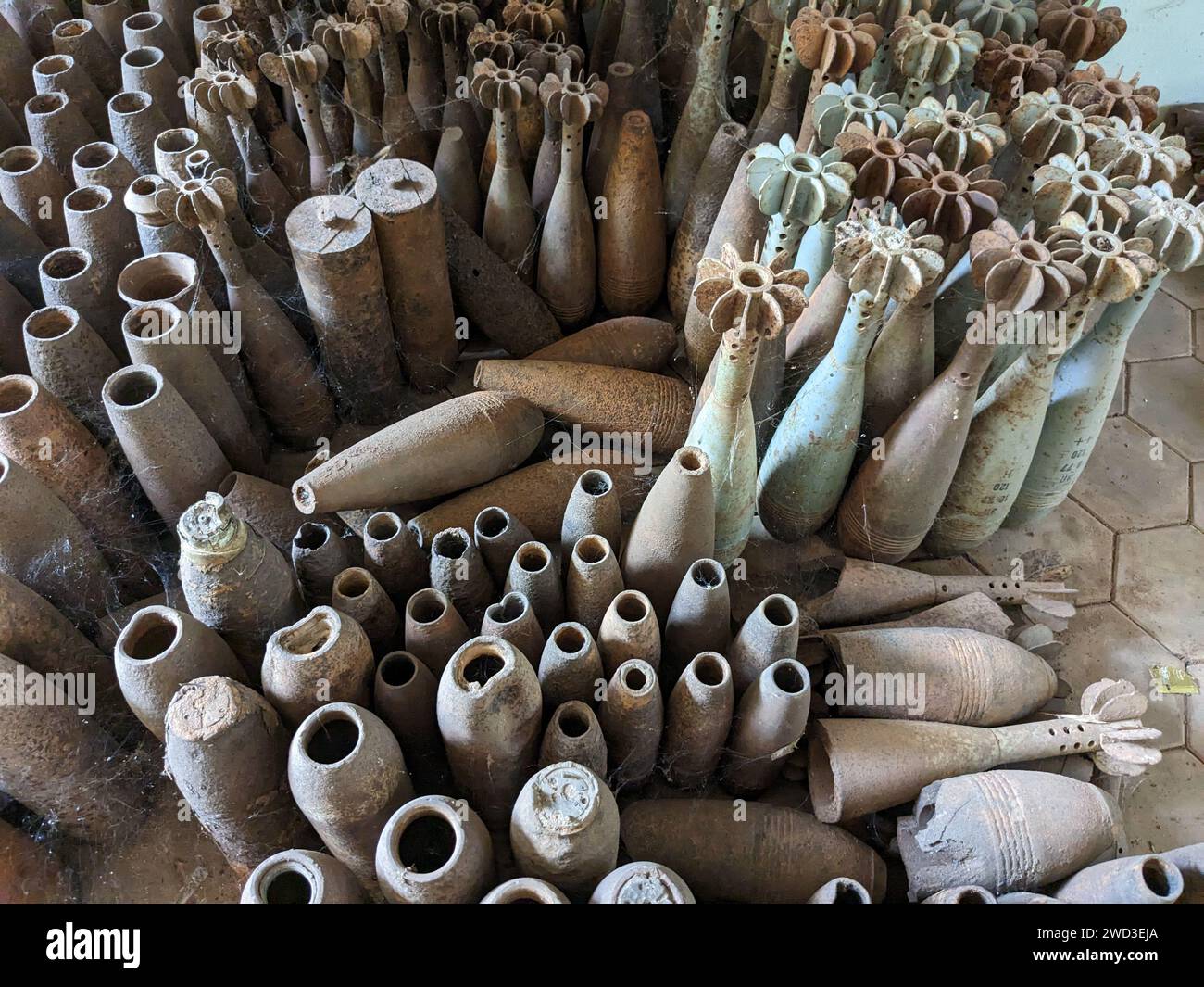 unexploded land mines and cluster bombs remains picked up all around ...