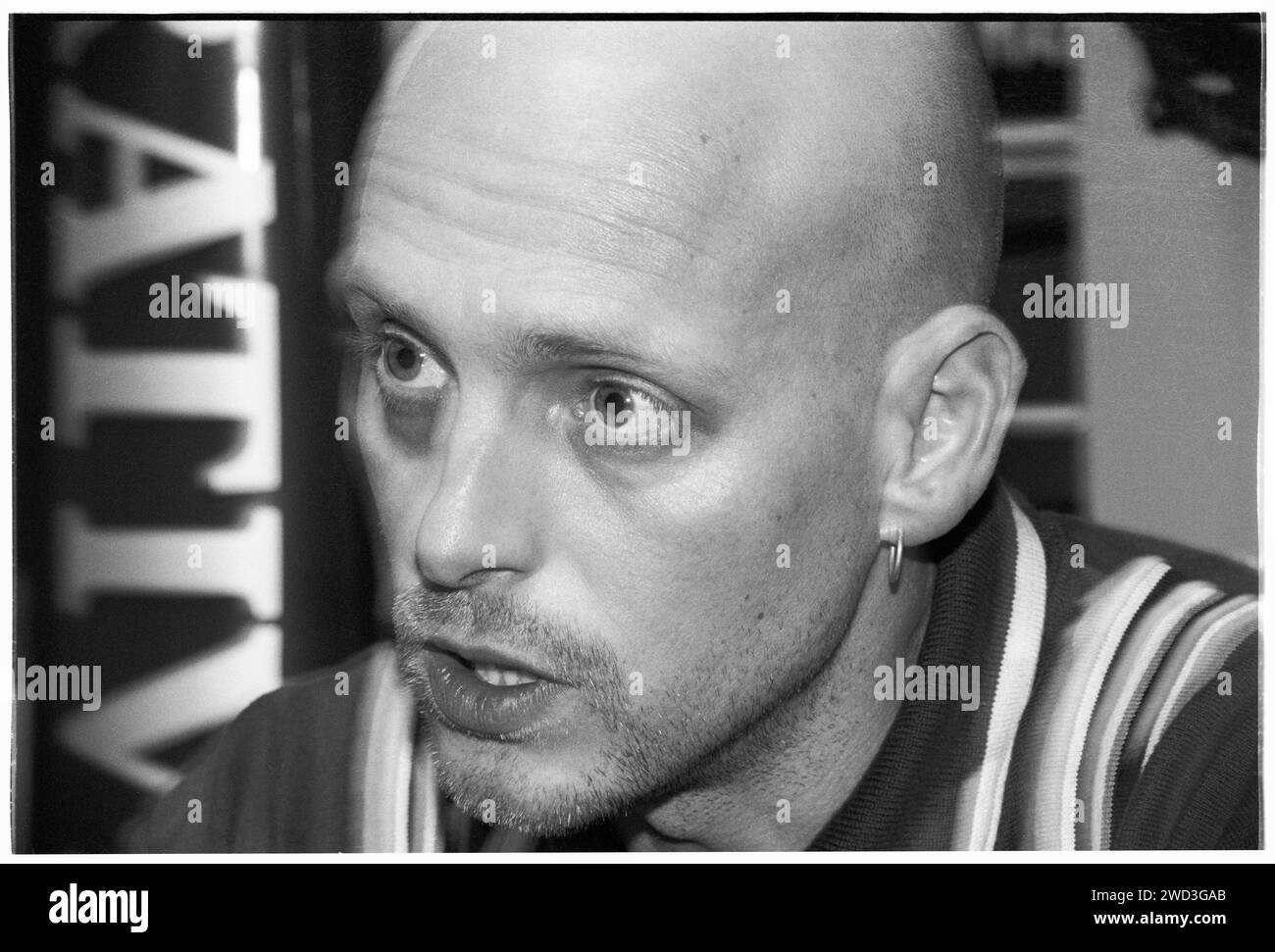 Phil Hartnoll of dance music legends Orbital backstage on a Megadog Tour at Cardiff University in Cardiff, Wales, UK on 4 October, 1993. Photo: Rob Watkins. INFO: Orbital, a pioneering electronic music duo from England formed in 1989, played a crucial role in the development of ambient and techno genres. Brothers Paul and Phil Hartnoll created innovative, atmospheric, and danceable tracks that have left a lasting impact on electronic music. Stock Photo