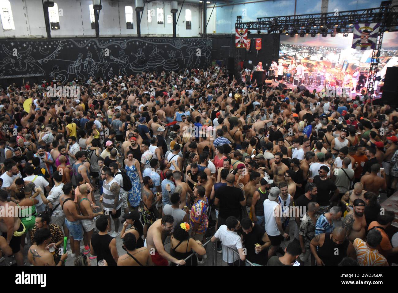 Revelers have fun on the first day of rehearsals for the Carnival block Acadêmicos do Baixo Augusta, held at the MST Cultural Galpão Stock Photo