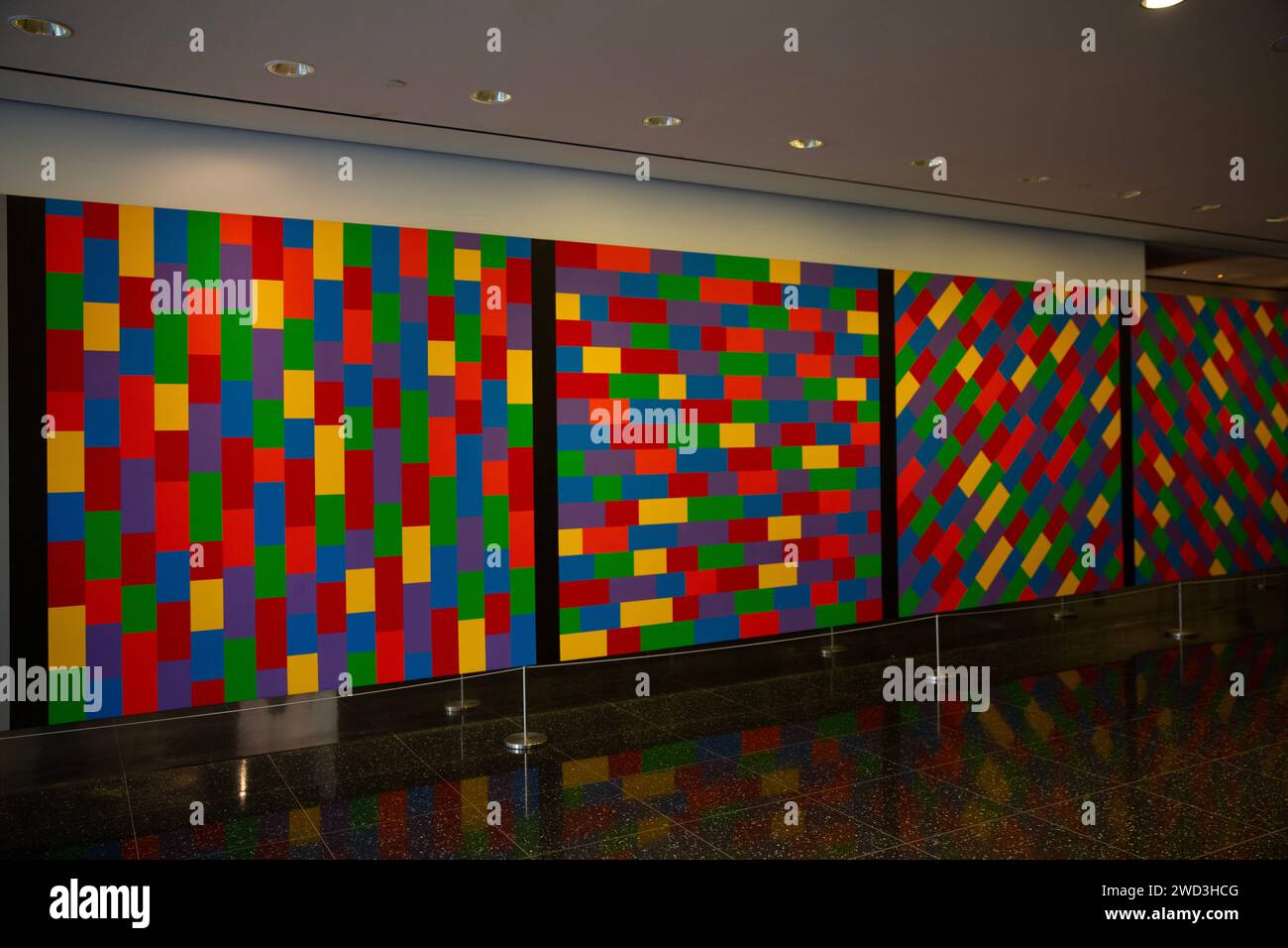 Wall Drawing #1144 - Broken Bands of Color in Four Directions, by Sol LeWitt, American, 2004, Acrylic, at the Museum of Modern Art. Stock Photo