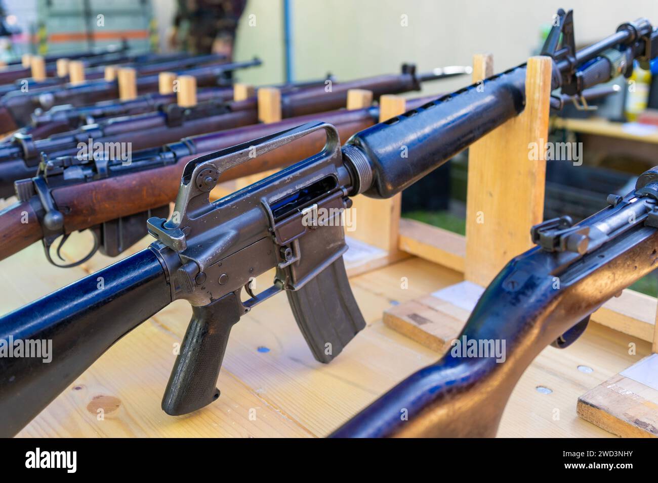 Old American classic M16 assault rifle among other weapons Stock Photo