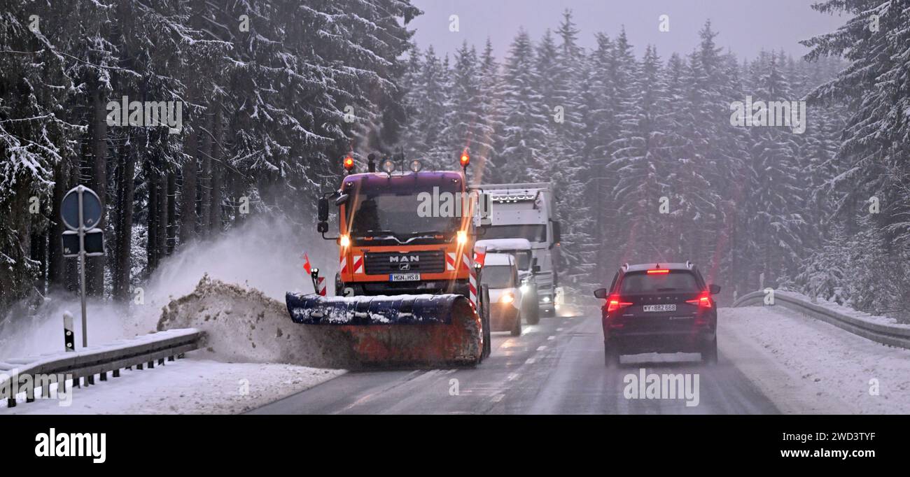  Erfurt, Germany. 18th Jan, 2024. A winter service vehicle clears snow Illustration 