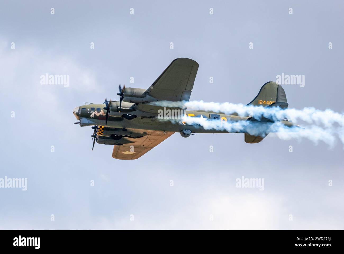Boeing B-17G Flying Fortress '124485' WW2 Bomber plane representing the famous 'Memphis Belle' flying in the sky Stock Photo