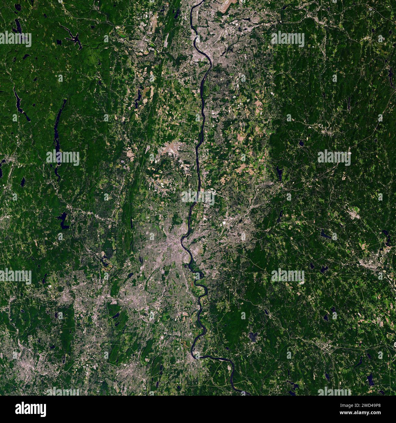 Usa. 15th Sep, 2022. The Operational Land Imager-2 on Landsat 9 captured this image of Simsbury on September 15, 2022. The tobacco farm where Martin Luther King worked Meadowood is located west of the Farmington River, a tributary of the Connecticut River. (Credit Image: © NASA/USGS/ZUMA Press Wire) EDITORIAL USAGE ONLY! Not for Commercial USAGE! Stock Photo