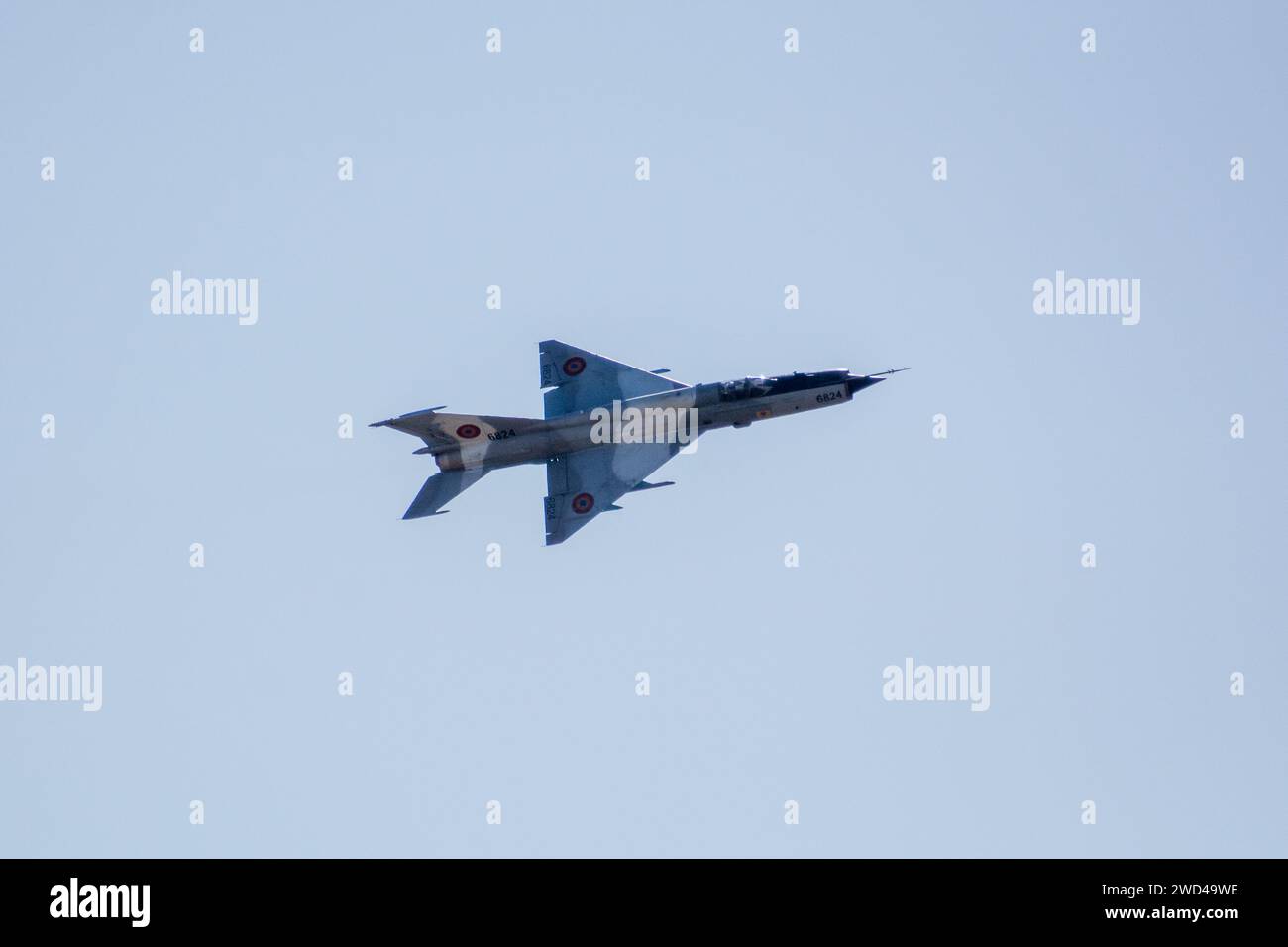 Mig 21 Romanian Air Force (RoAF) MiG-21MF-75 6824. Flying Mikoyan-Gurevich 21 Lancer flying fast. Romania retired this soviet era fighter jet in 2023. Stock Photo
