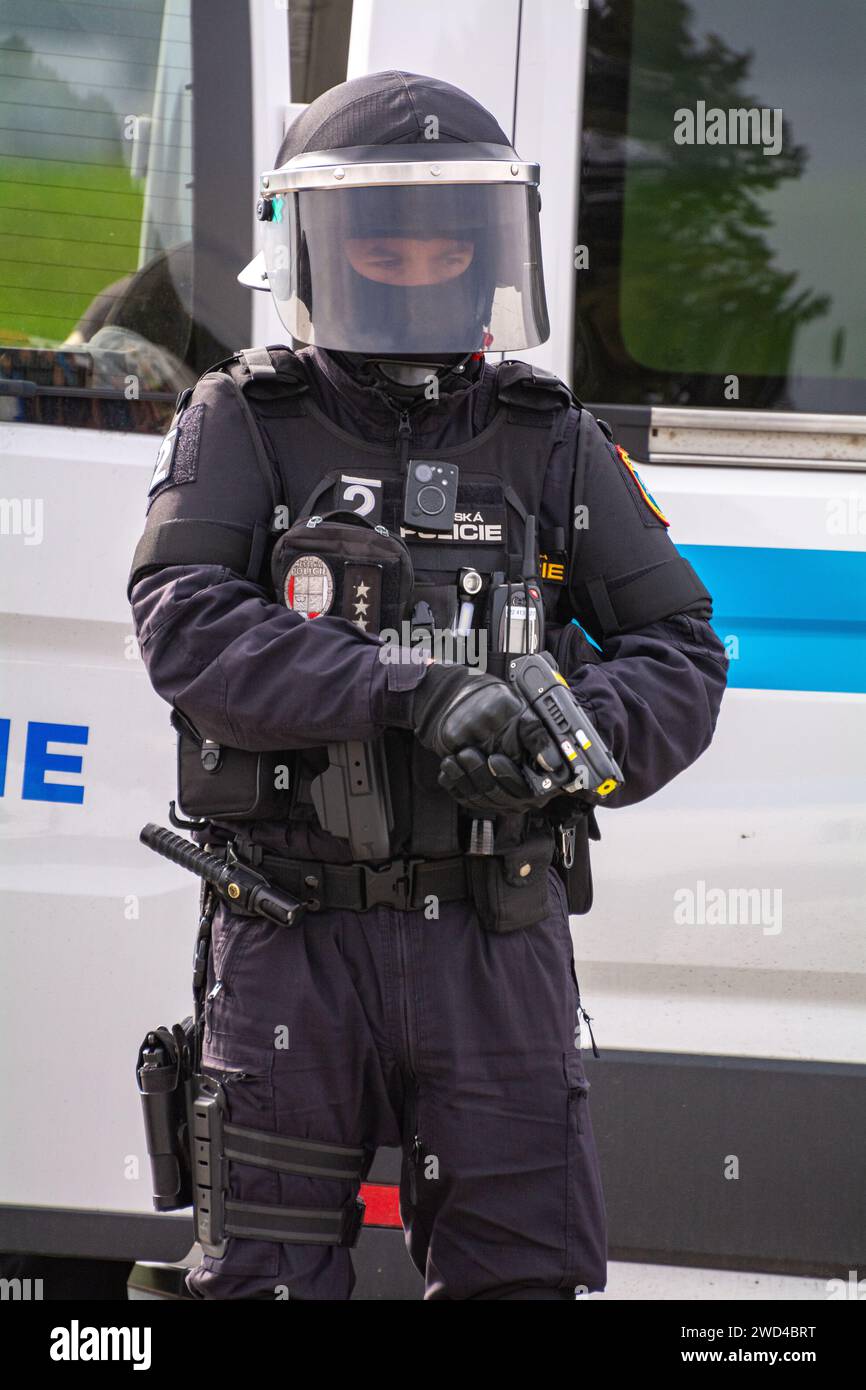 Police officers arresting protesters during a riot. Czech Republic city police městská policie in tactical uniform during a demonstration in Ostrava. Stock Photo