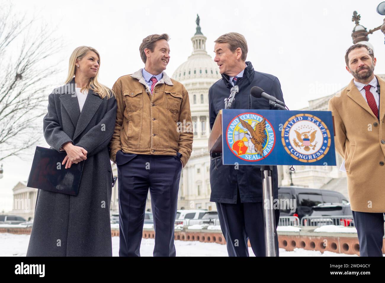 Washington, District Of Columbia, USA. 18th Jan, 2024. Rep. Brittany Peterson, left, Denver Mayor Mike Johnston, Senator Michael Bennet and Rep. Jason Crow hold a news conference Thursday, Jan. 18, 2024 in Washington urging Congress to support cities managing the migrant crisis. (Credit Image: © Eric Kayne/ZUMA Press Wire) EDITORIAL USAGE ONLY! Not for Commercial USAGE! Stock Photo