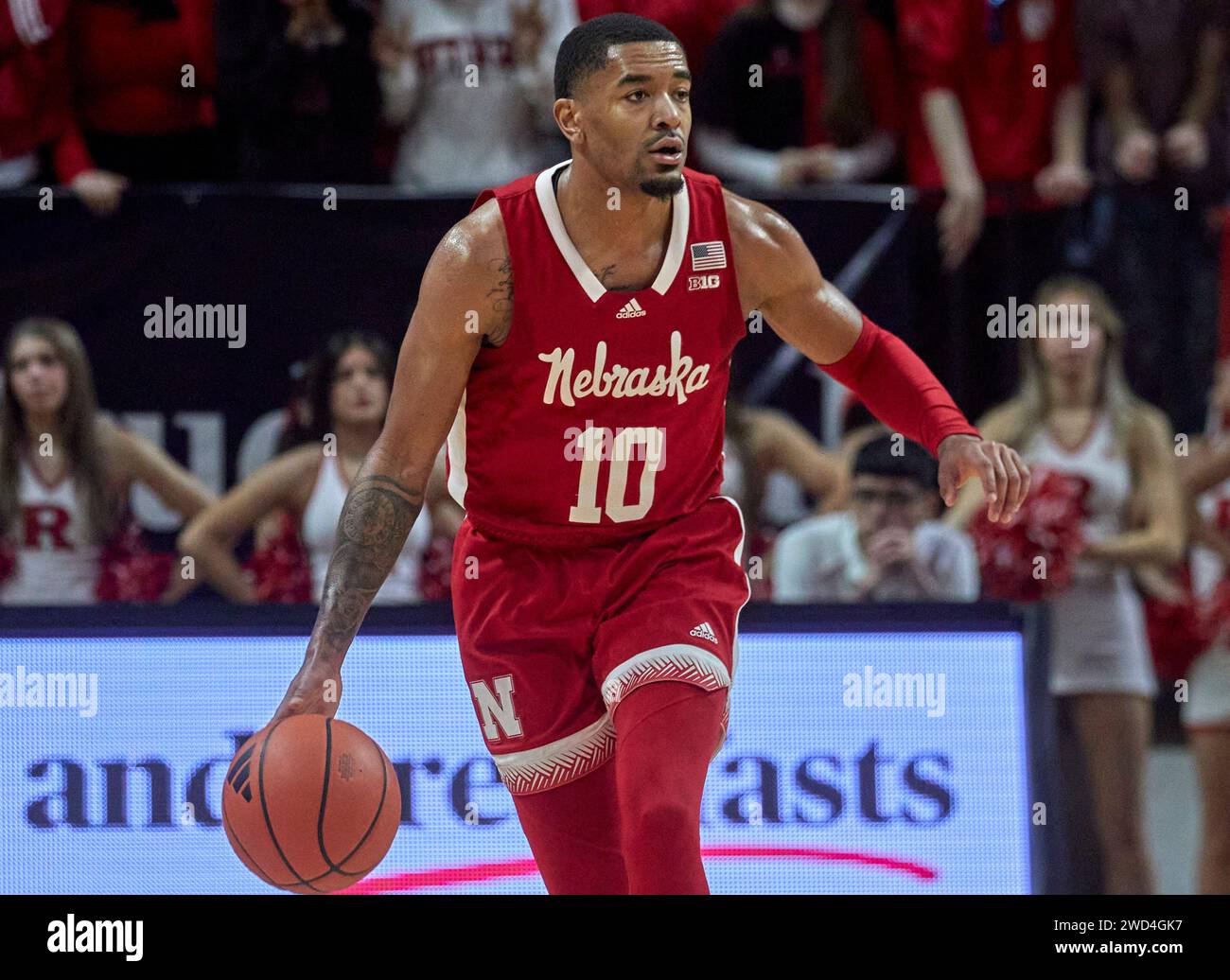 Nebraska Cornhuskers guard Jamarques Lawrence (10) brings the ball up court in the first half