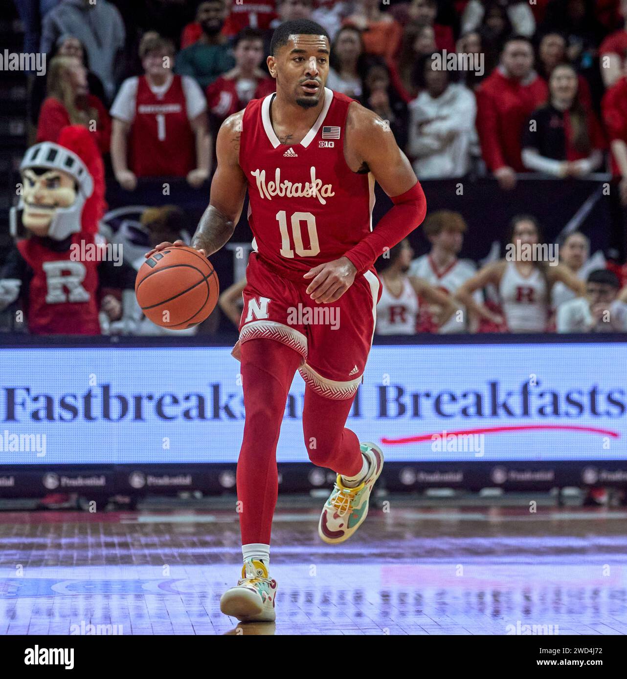 Nebraska Cornhuskers guard Jamarques Lawrence (10) brings the ball up court in the first half