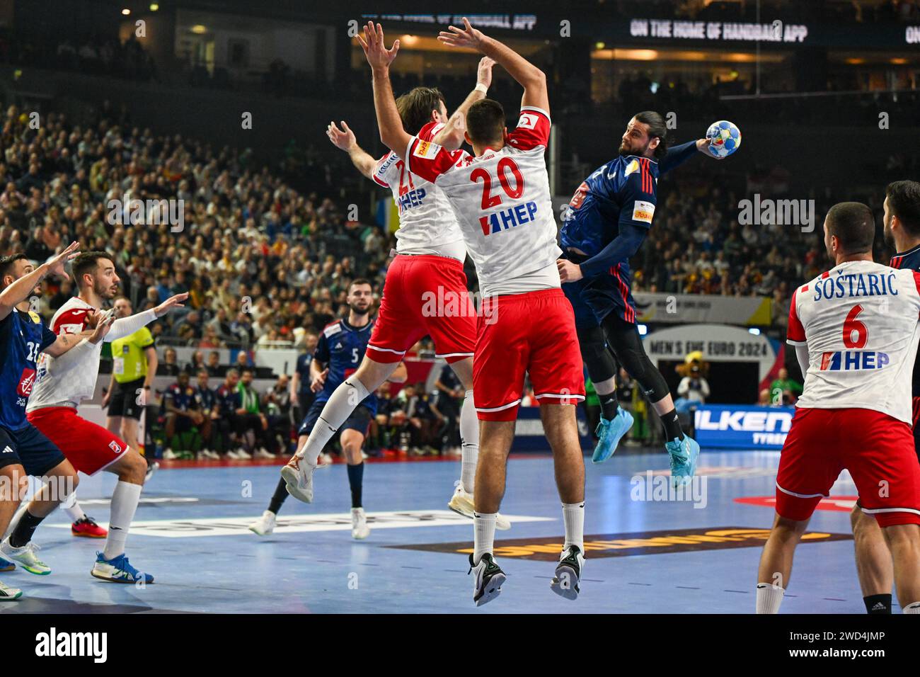 Cologne, Germany. 18th Jan, 2024. Elohim Prandi (France) in action against Mateo Maras (Croatia) and Veron Nacinovic (Croatia) during the Menâ&#x80;&#x99;s EHF Euro 2024 match between France vs. Croatia at the Lanxess Arena in Berlin, Cologne Credit: Independent Photo Agency/Alamy Live News Stock Photo