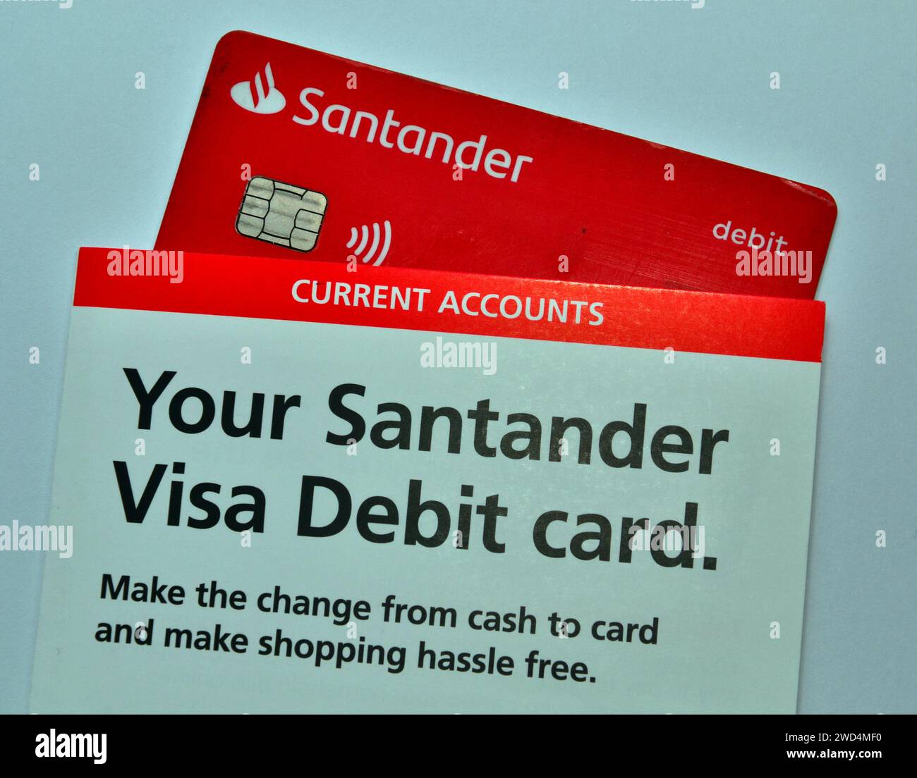 A santander debit card with a Santander bank leaflet to describe these