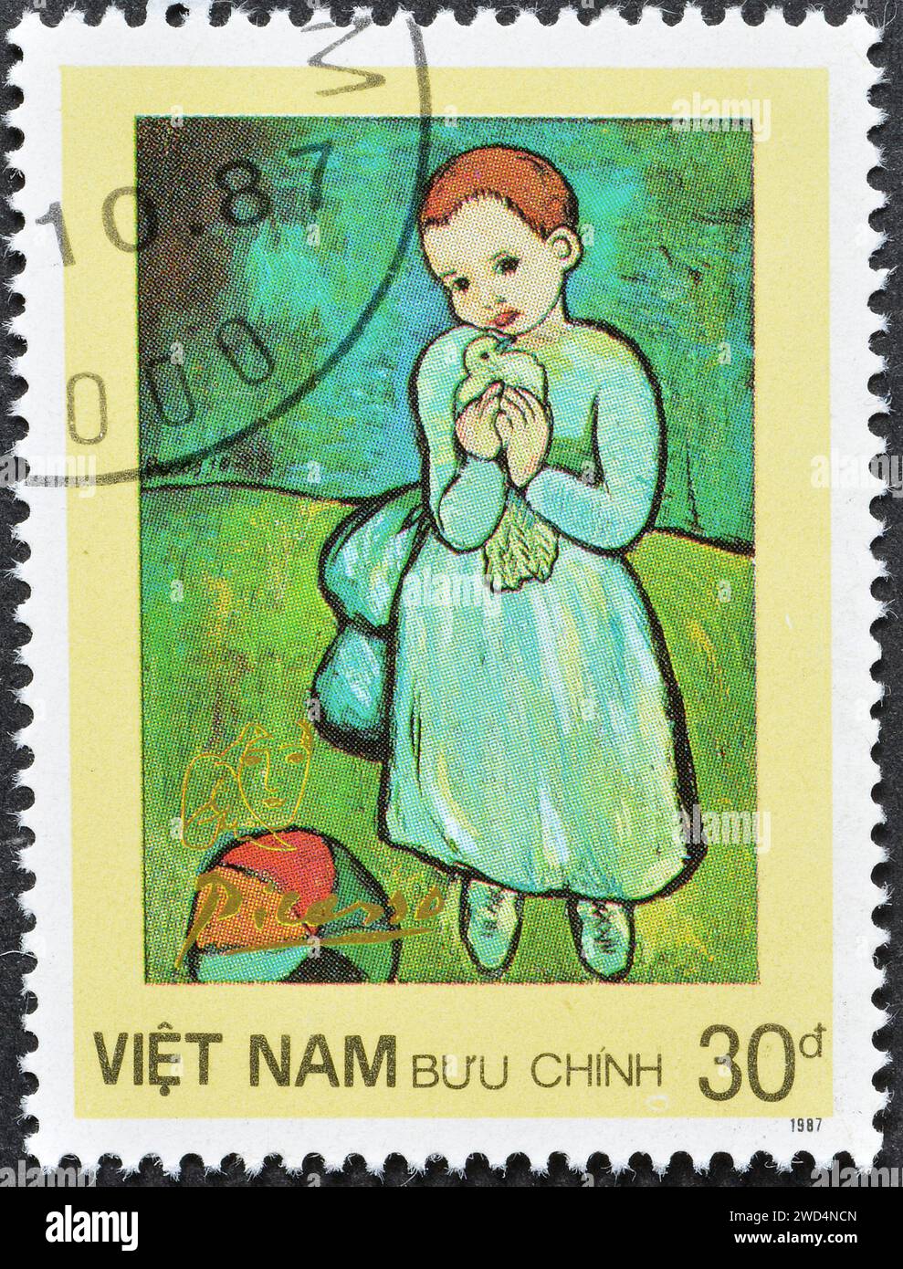 Cancelled postage stamp printed by Vietnam, that shows painting Child Holding a Dove by Pablo Picasso, circa 1987. Stock Photo