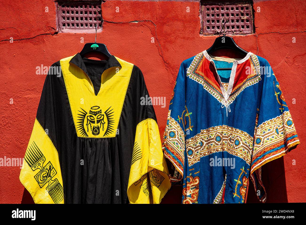 Kaftans on display for sale at outdoor market. Stock Photo