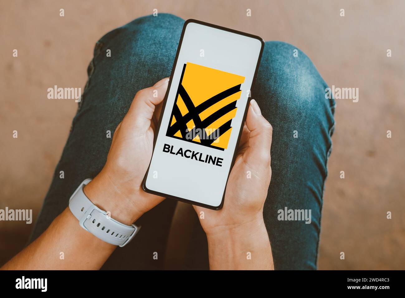 In this photo illustration, the BlackLine Systems, Inc. logo is displayed on a smartphone screen. Stock Photo