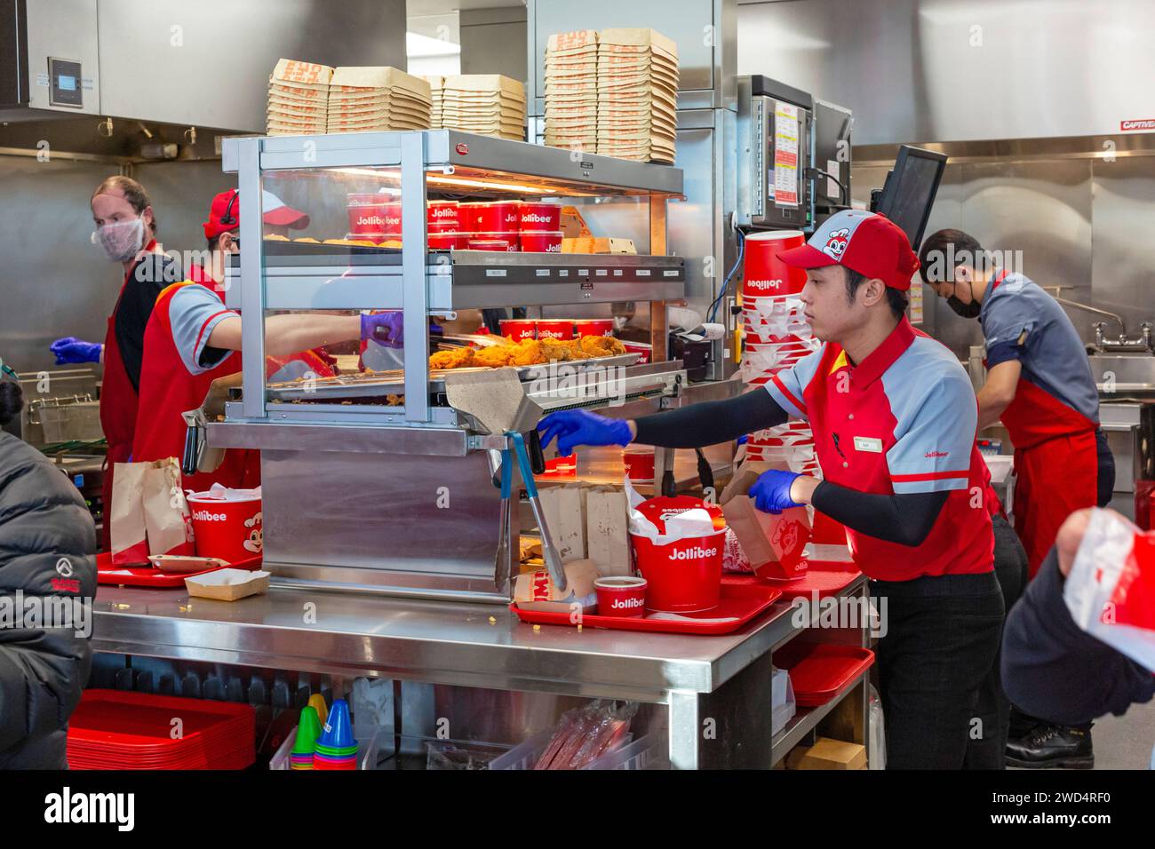 Sterling Heights, Michigan Workers serve up Chickenjoy fried chicken