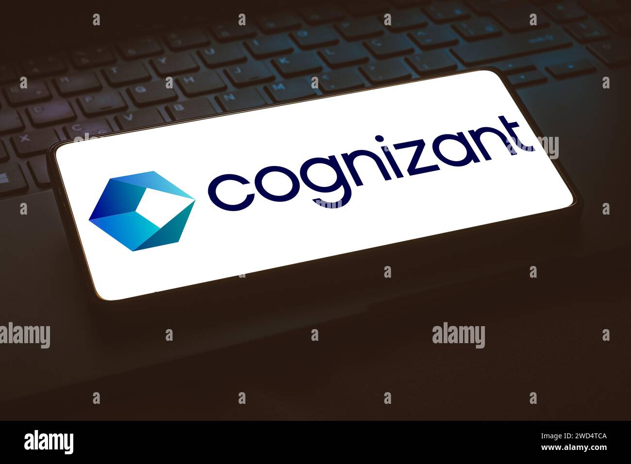 Brazil. 15th Jan, 2024. In this photo illustration, the Cognizant Technology Solutions Corporation logo is displayed on a smartphone screen while resting on a laptops' keyboard. (Credit Image: © Rafael Henrique/SOPA Images via ZUMA Press Wire) EDITORIAL USAGE ONLY! Not for Commercial USAGE! Stock Photo