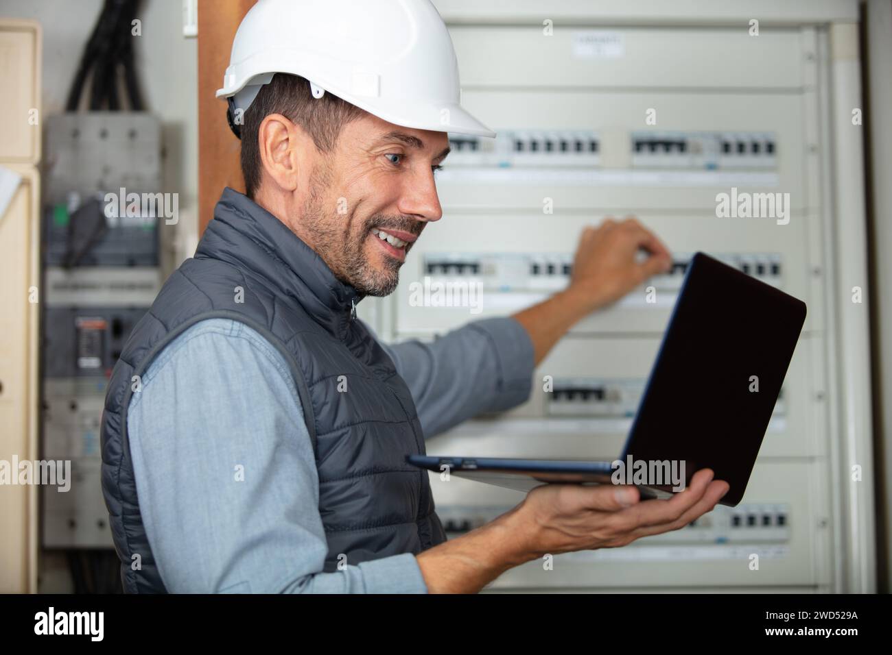 maintenance engineer inspecting relay protection system Stock Photo Alamy