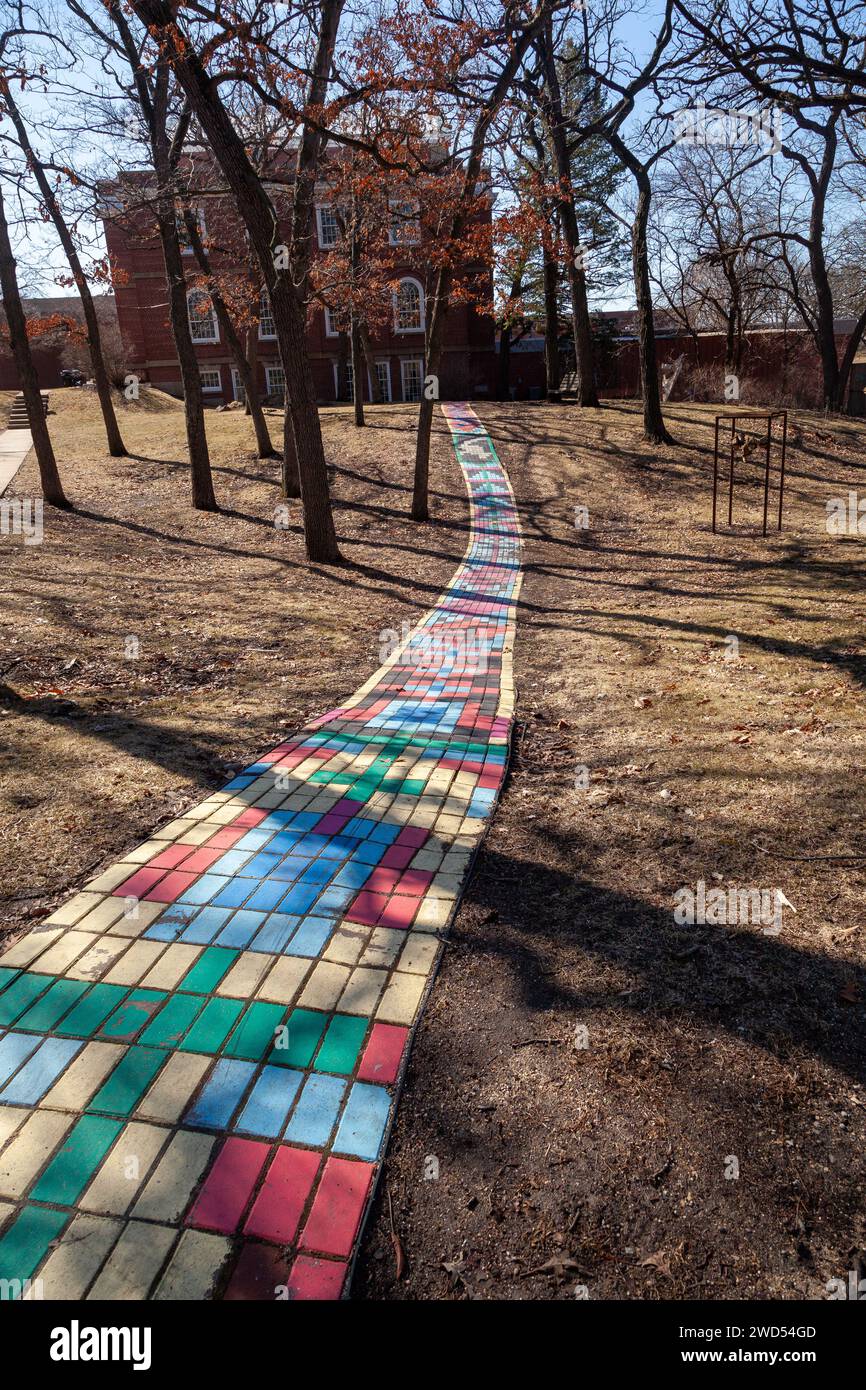 Colorful brick path leading to campus buildings Stock Photo