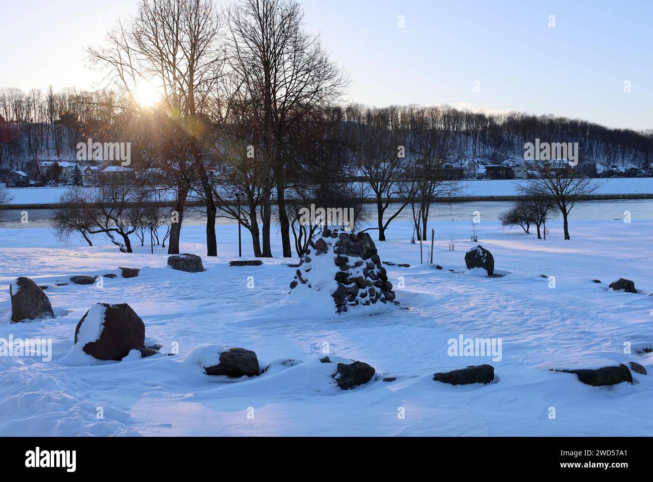 The sunset view of a historic pagan altar that is still in operation in Kaunas old town park by Neman River (Lithuania). Stock Photo