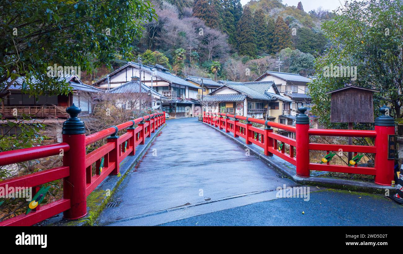 Japanese Cities Bridge Rural Red traditional Japanese bridge to small village in forested mountains ...