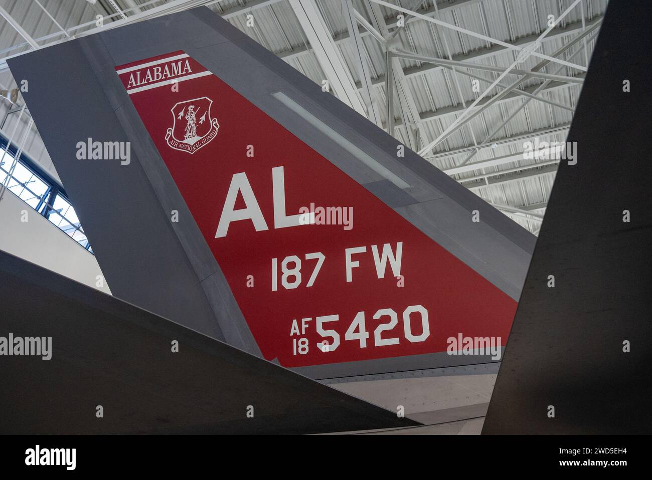 An F-35A Lightning II from the 187th Fighter Wing showcases heritage tail flash at Dannelly Field, Ala., January 12, 2024. The blackboard of the F-35 was painted to honor the Tuskegee Airmen, Red Tails and their new-build aircraft deliveries from Lockheed Martin’s assembly line will begin later in 2024. Stock Photo