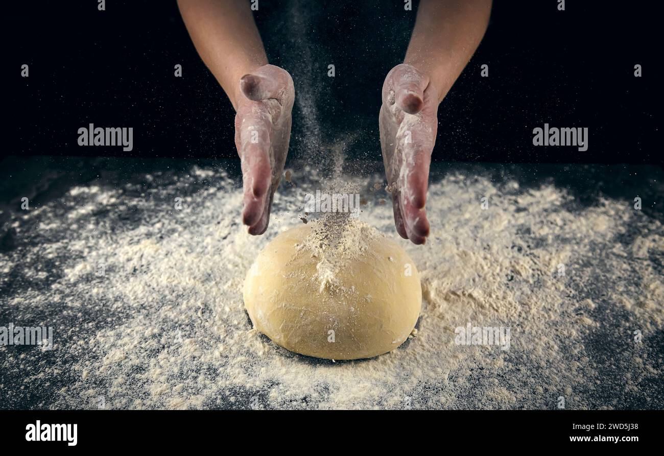Man in kitchen sprinkle white hi-res stock photography and images - Alamy