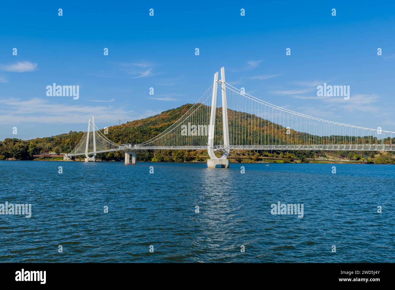 Topjeong lake in South Korea with white suspension bridge in background ...