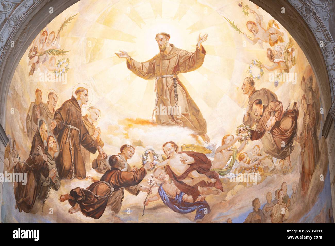 VICENZA, ITALY - NOVEMBER 7, 2023: The fresco of St. Francis of Assisi among the franciscan saints in apse of church Chiesa di Santa Lucia Stock Photo